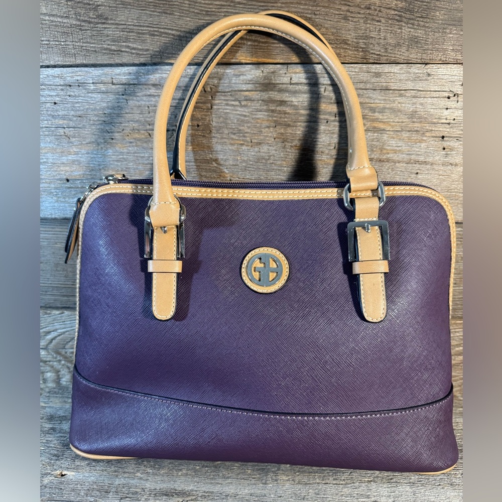 Gianni Bernini Dome Purse in purple/plum and tan edging and handle. Like new.